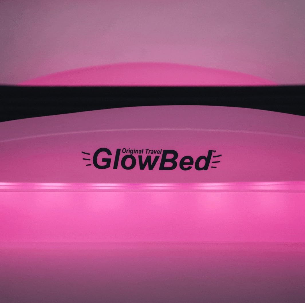 GLOWBED tuck feature with crib sheets secured around the mattress