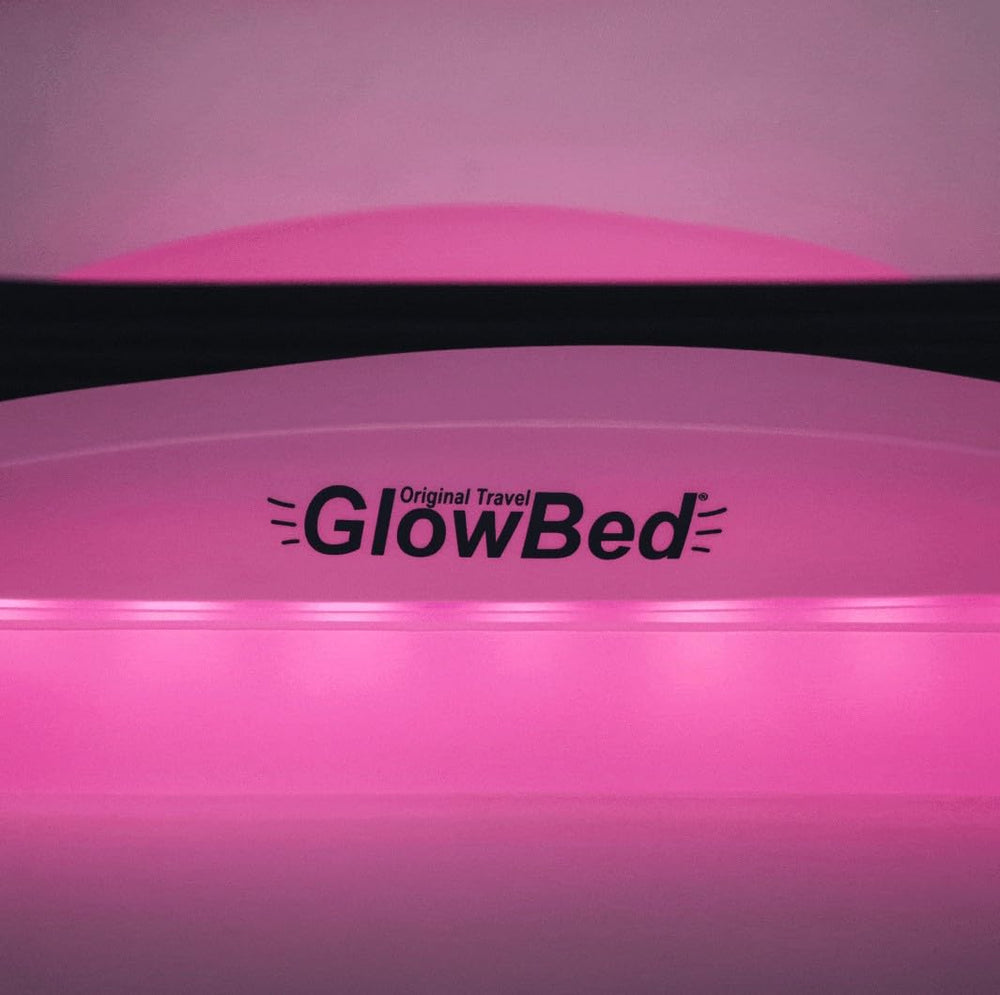 GLOWBED tuck feature with crib sheets secured around the mattress