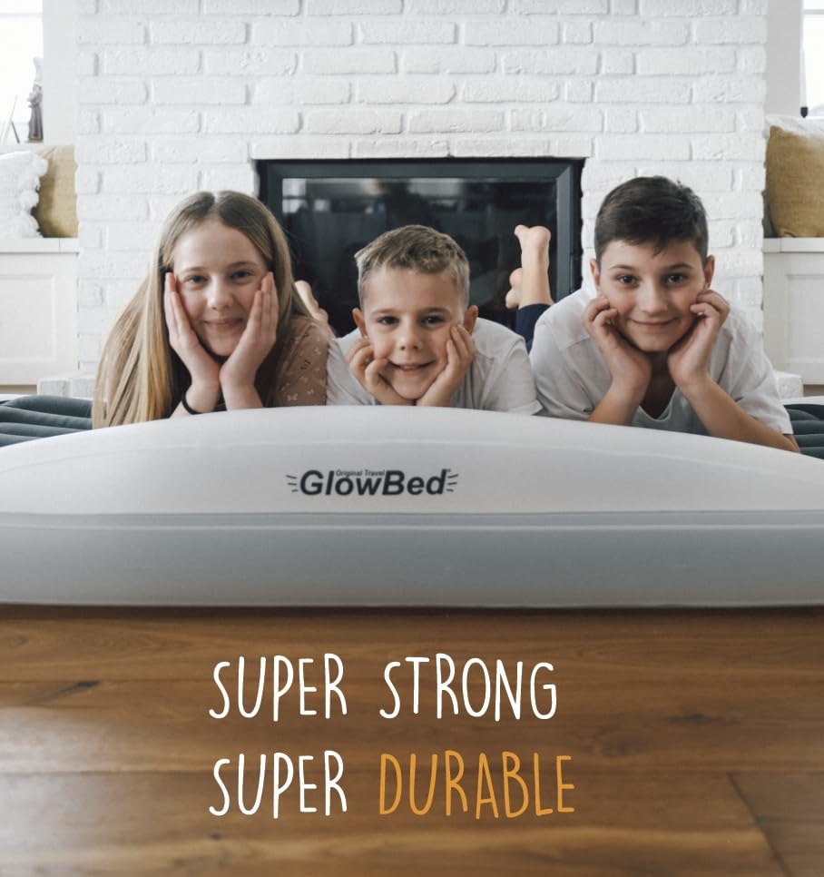 GLOWBED travel bed in a hotel room supporting sleepovers and trips