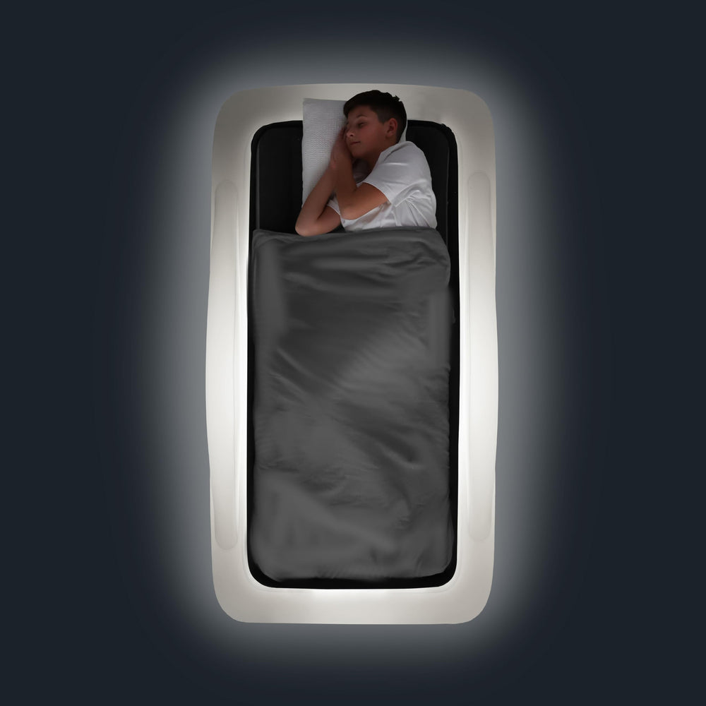 GLOWBED inflatable travel bed with LED remote control for versatile color options
