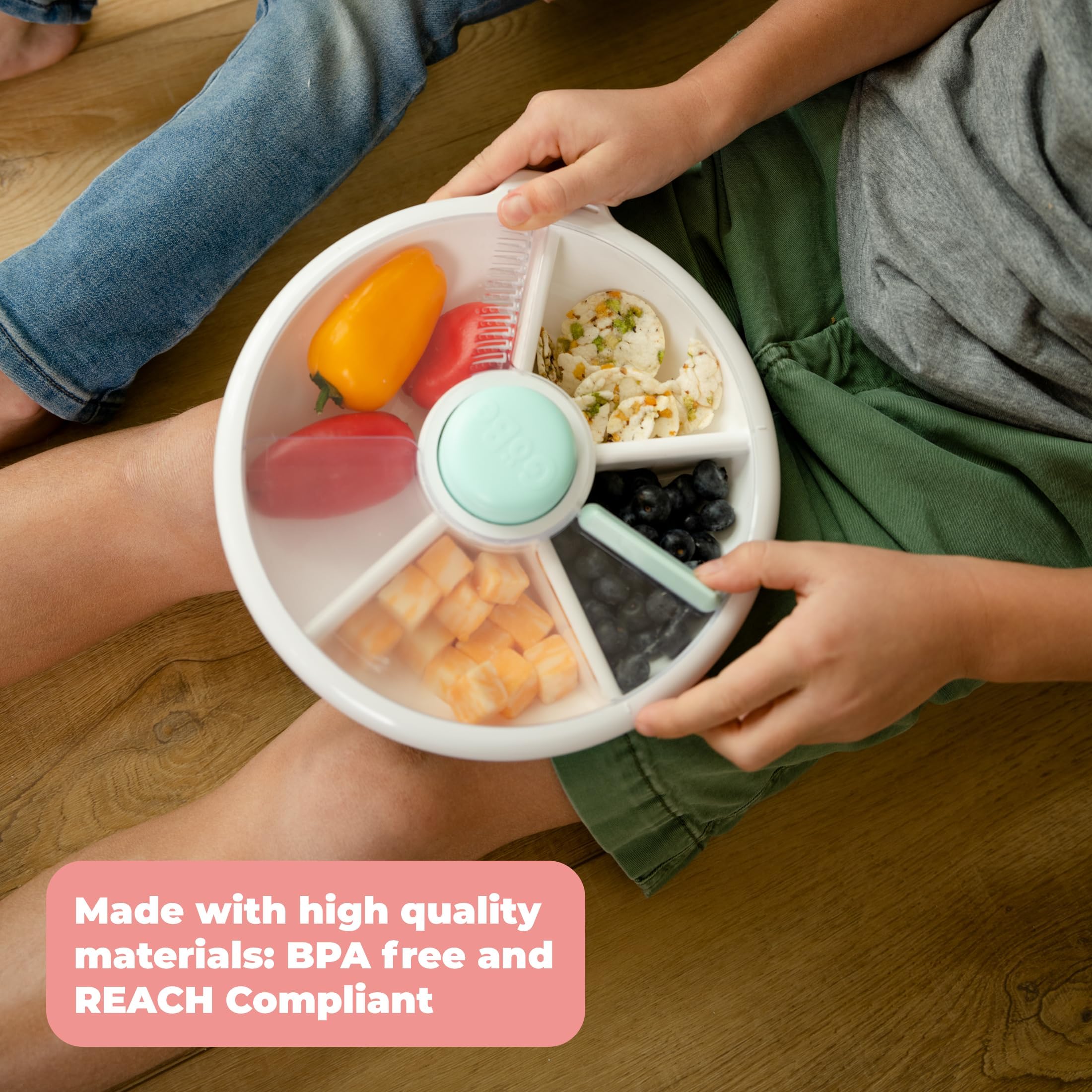 GoBe Kids snack spinner lid closeup showing airtight, spill-proof design for mess-free lunches