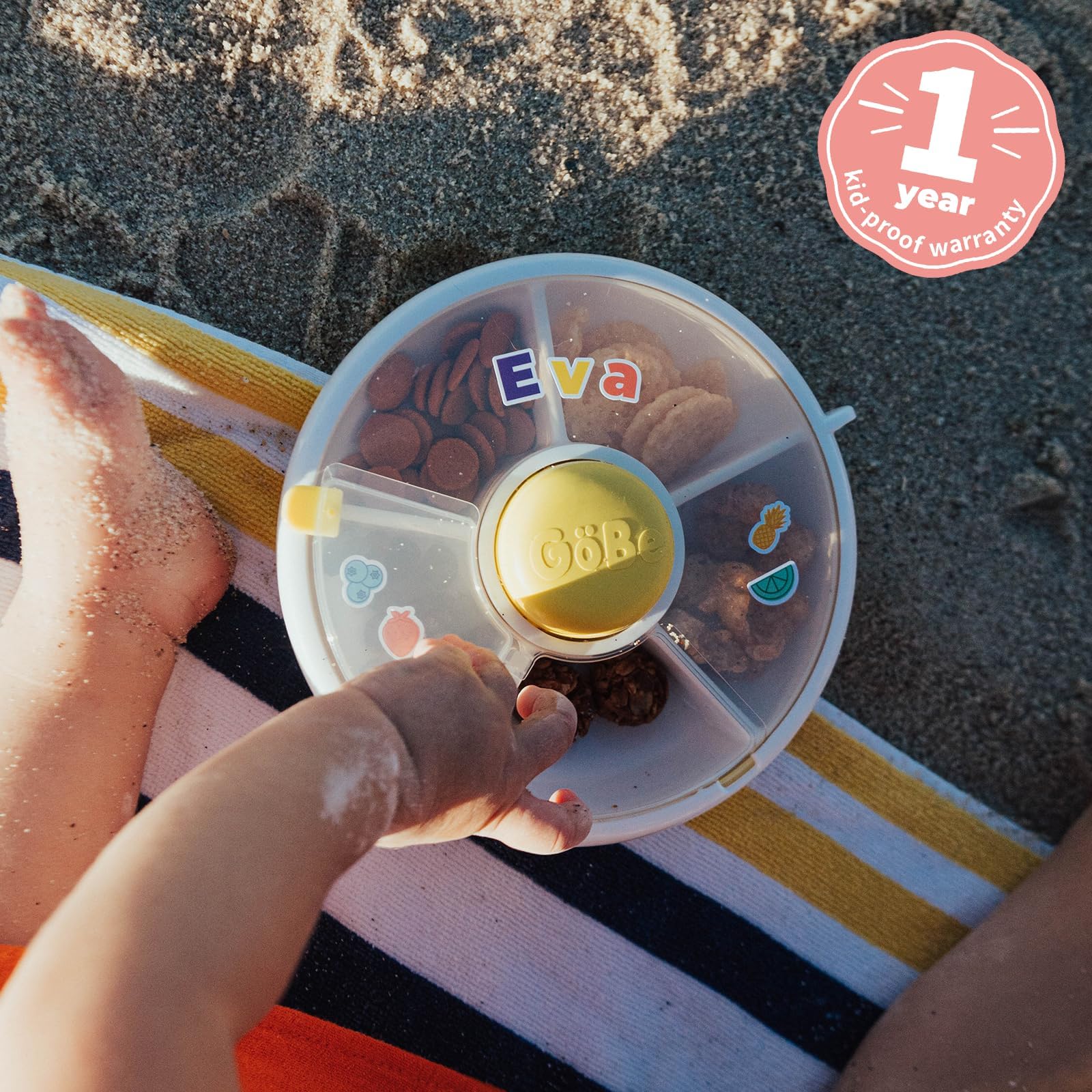 GoBe Kids interactive dispensing button detail for independent snack selection.