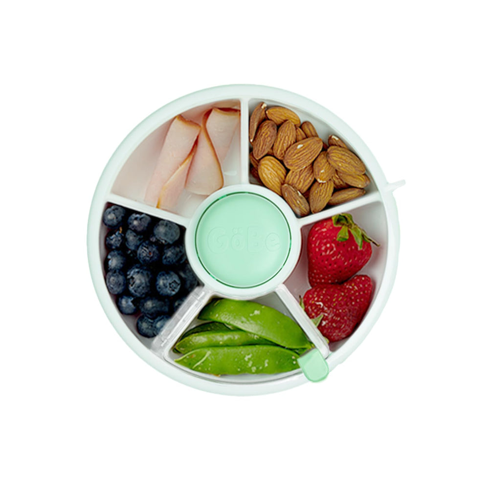 GoBe Kids snack spinner front view mint green for mess-free on-the-go snacking.