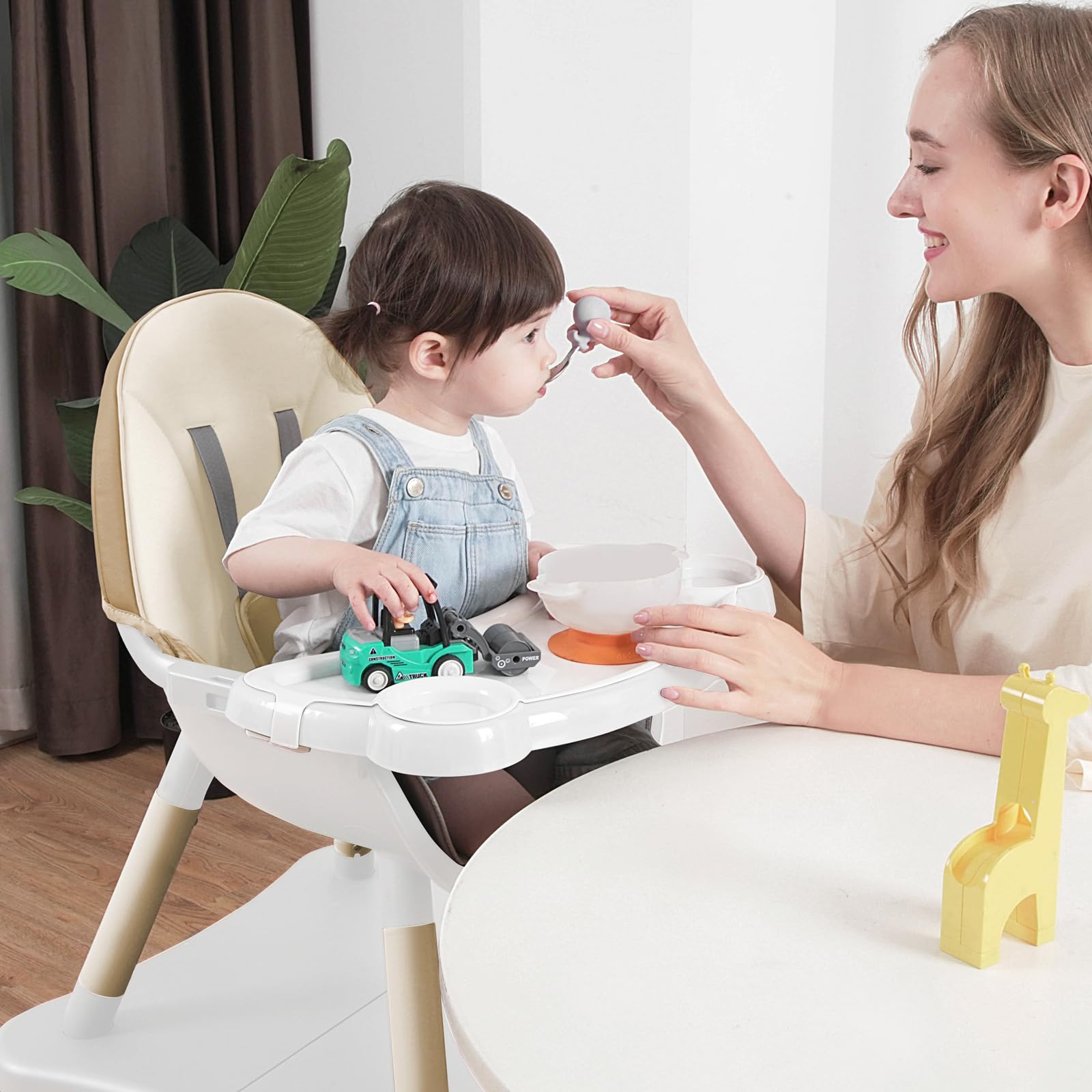 GoFirst 4-level adjustable tray shows growing child fits multiple positions.