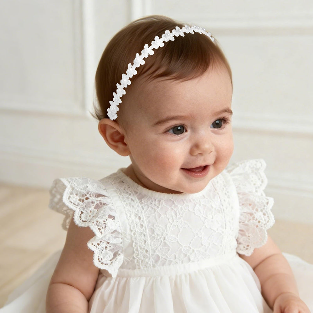 Goktvai model wearing baptism headband showcases elegant wedding-ready styling.