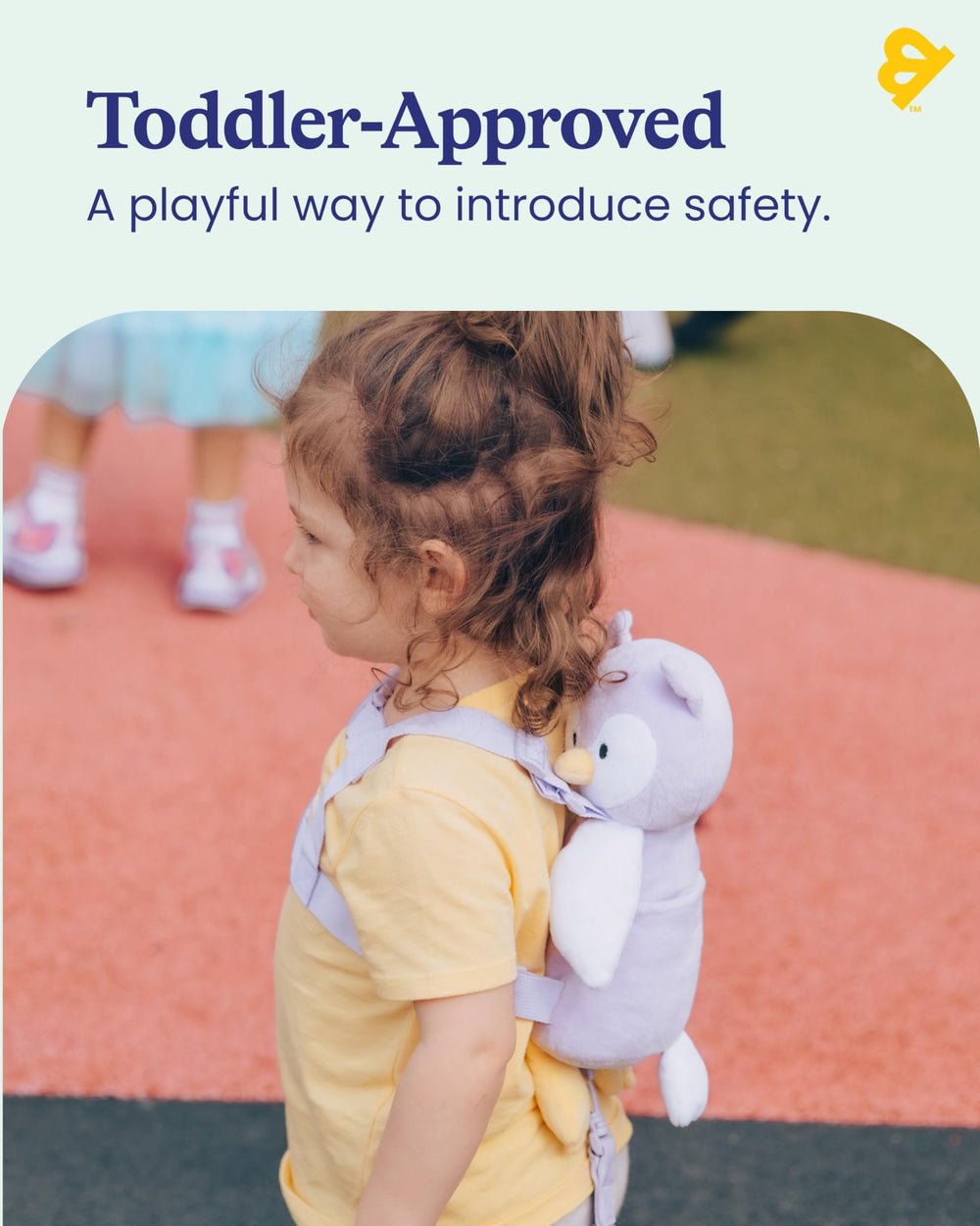 GoldBug Owl harness worn on child highlights hands-free control during errands.