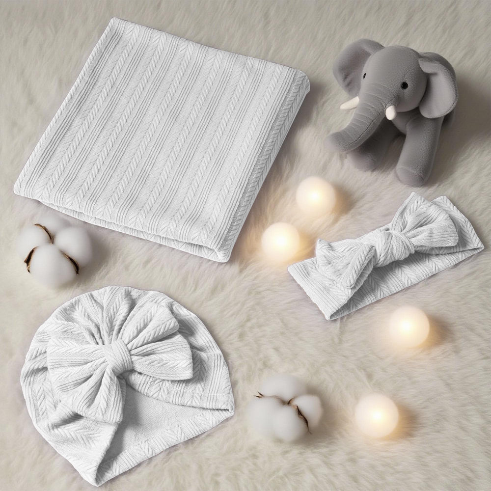Golener swaddle blanket with textured knit close-up highlighting cozy stretch.