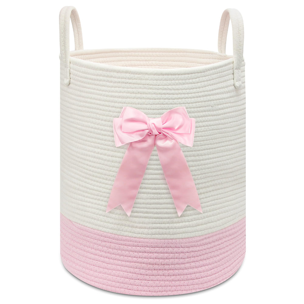 Goodheim pink-woven laundry hamper with bow adds charming nursery storage
