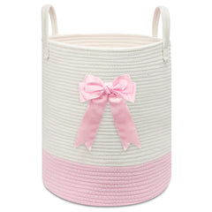 Goodheim pink-woven laundry hamper with bow adds charming nursery storage