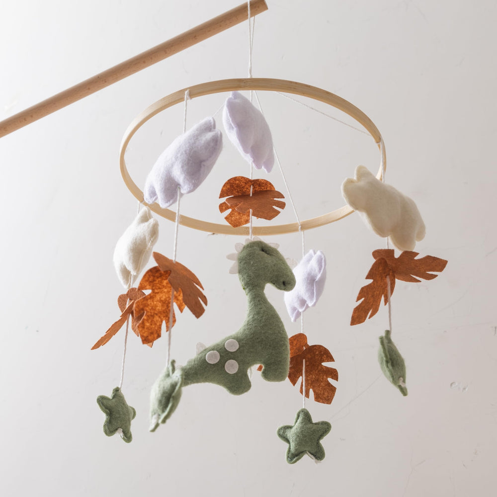 Goodmom Dinosaur Mobile Clouds Stars presents dreamy visuals to captivate babies during crib time.