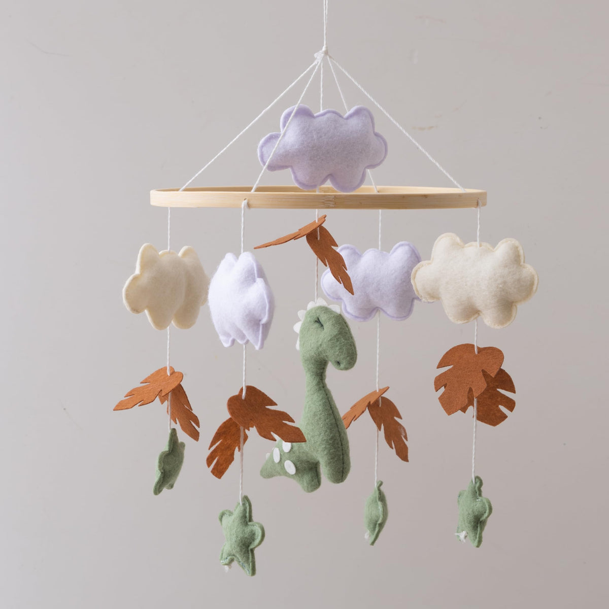 Goodmom Dinosaur Mobile Wooden Frame highlights a playful nursery focal point and safe crib decor.