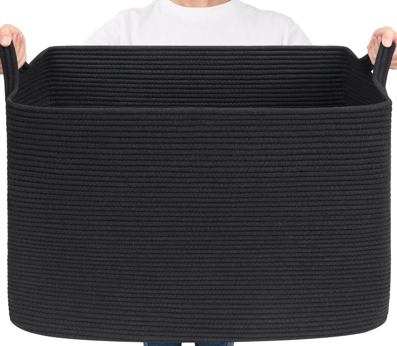 Goodpick Large Woven Storage Basket holding blankets for organized living room storage.