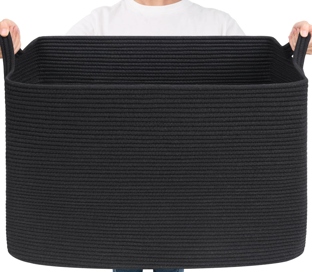 Goodpick Large Woven Storage Basket holding blankets for organized living room storage.