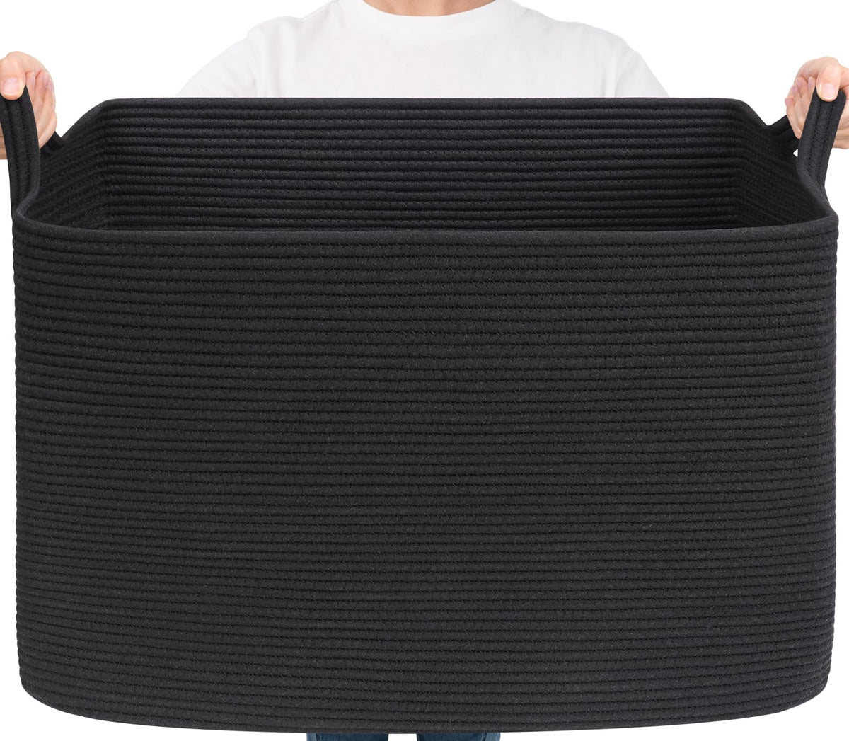 Goodpick Large Woven Storage Basket holding blankets for organized living room storage.