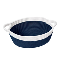 Goodpick small woven basket under changing table shows nursery storage convenience