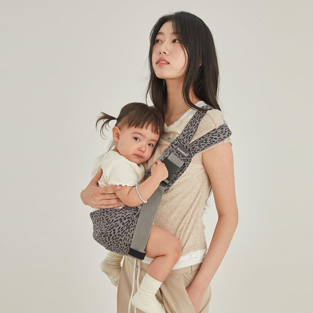 Gooseket 365 toddler carrier in outdoor stroll showing hands-free mobility.