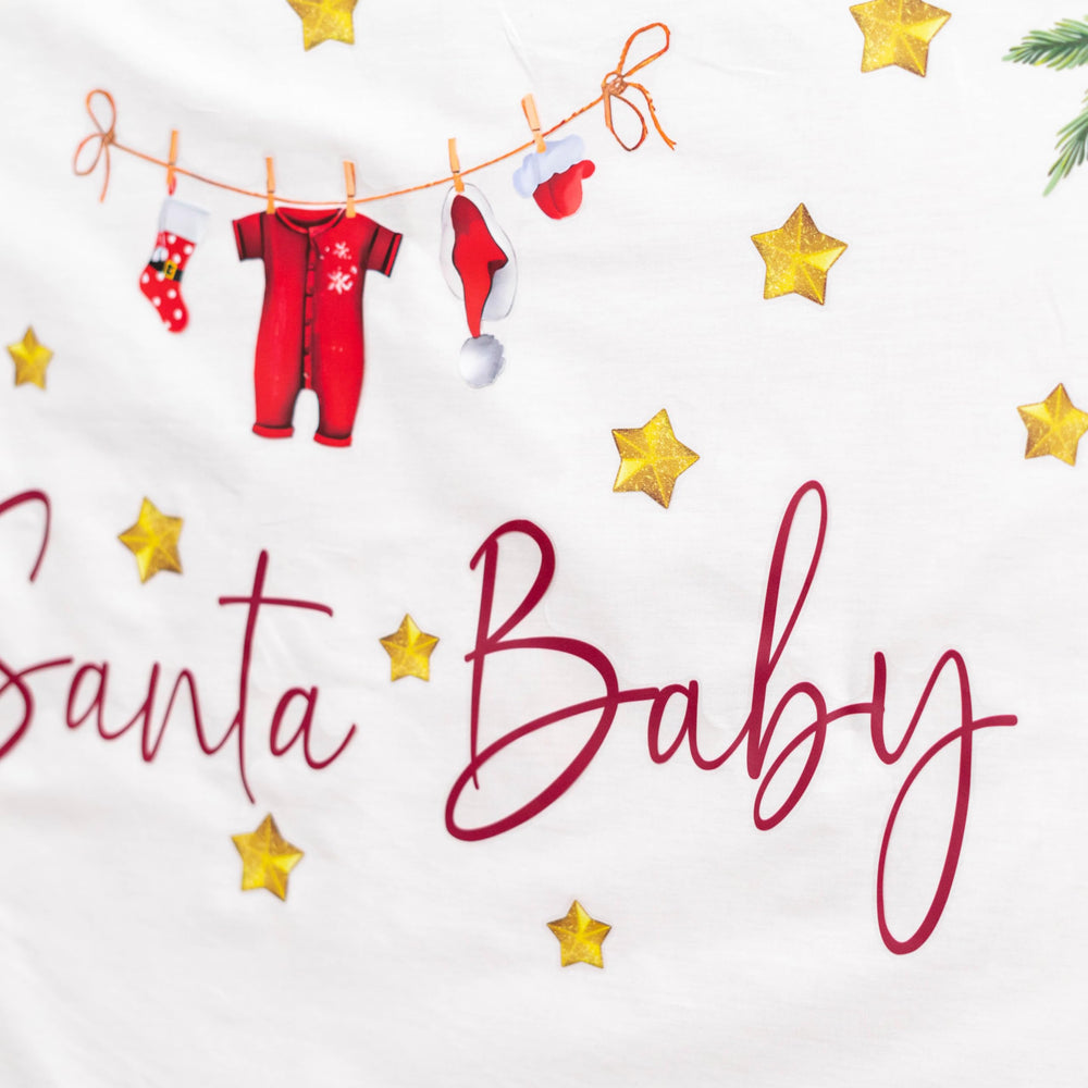 Gostman Santa Baby decals elevate a festive party setup with coordinated decor.