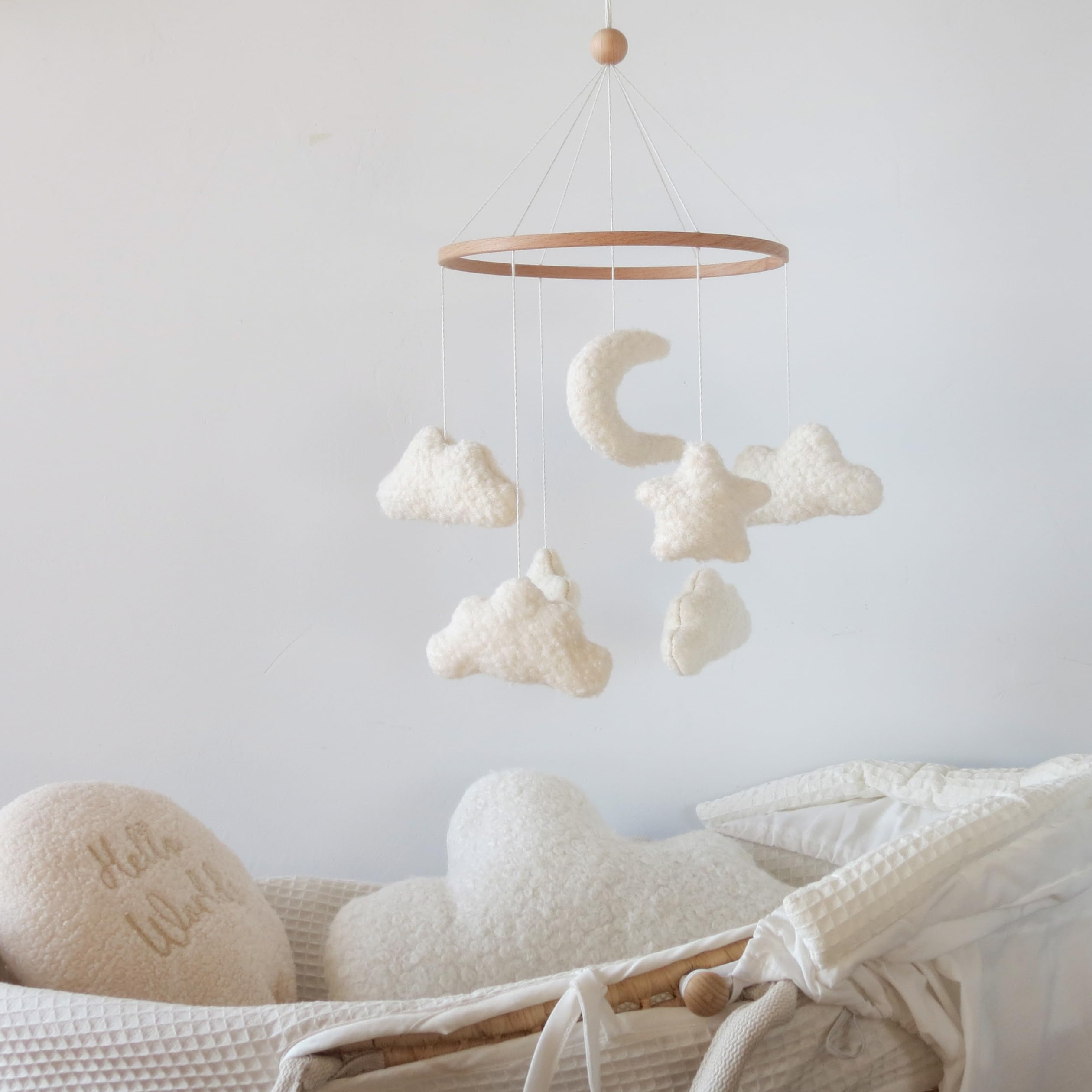 Goukurlsma Cloud Crib Mobile wood accents add warmth to crib décor