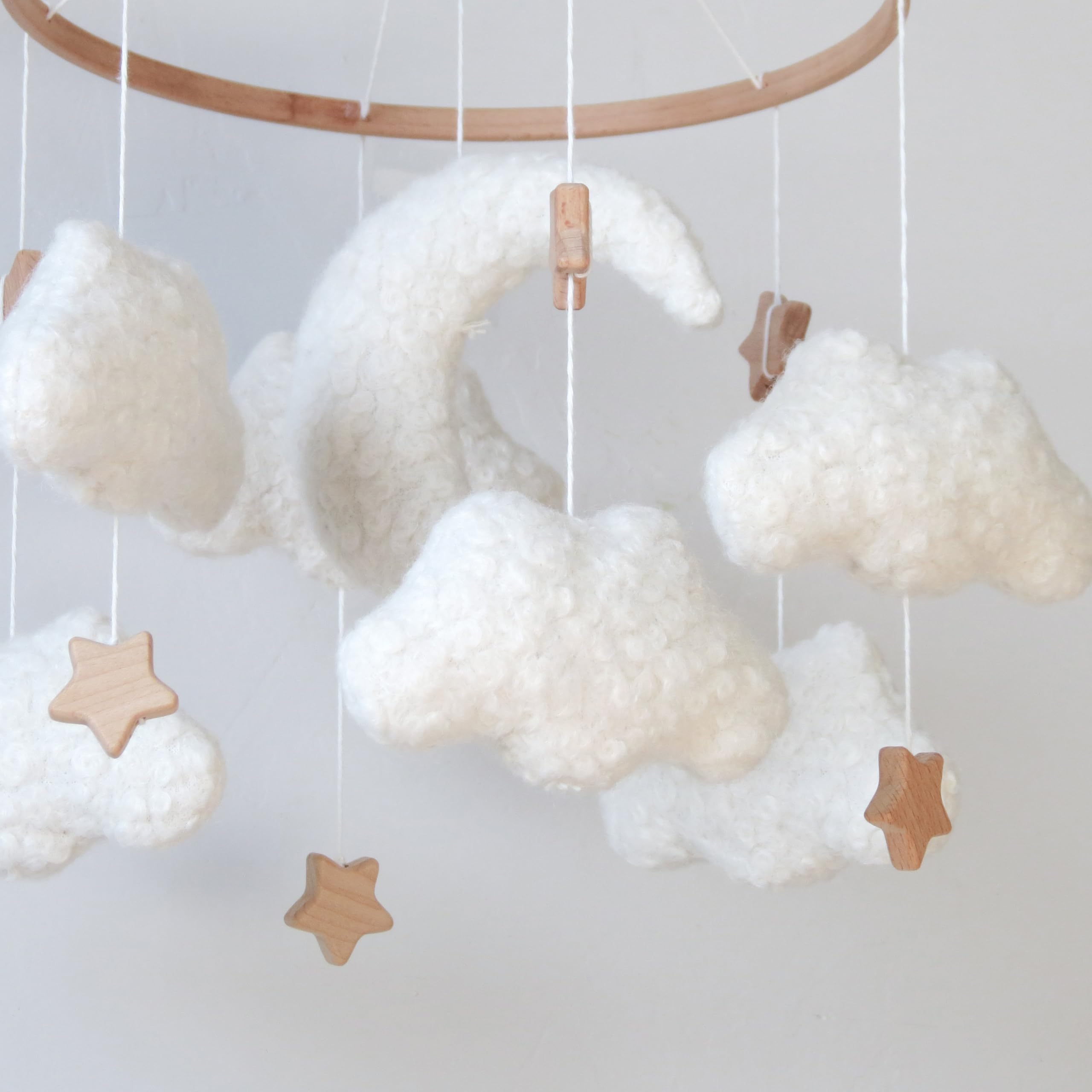 GOUKURLSMA cloud mobile suits crib or bassinet use, adding whimsy to nighttime routines.