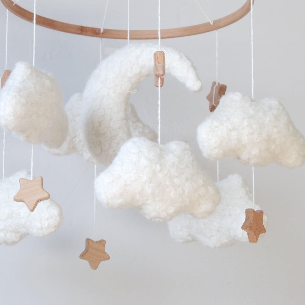 GOUKURLSMA cloud mobile suits crib or bassinet use, adding whimsy to nighttime routines.