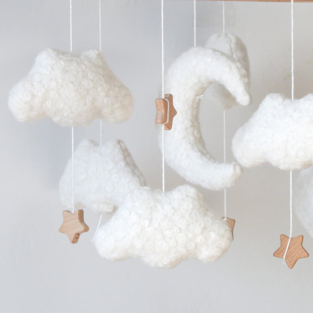 GOUKURLSMA cloud mobile designed to be hung from ceiling or crib arm for flexible setup.