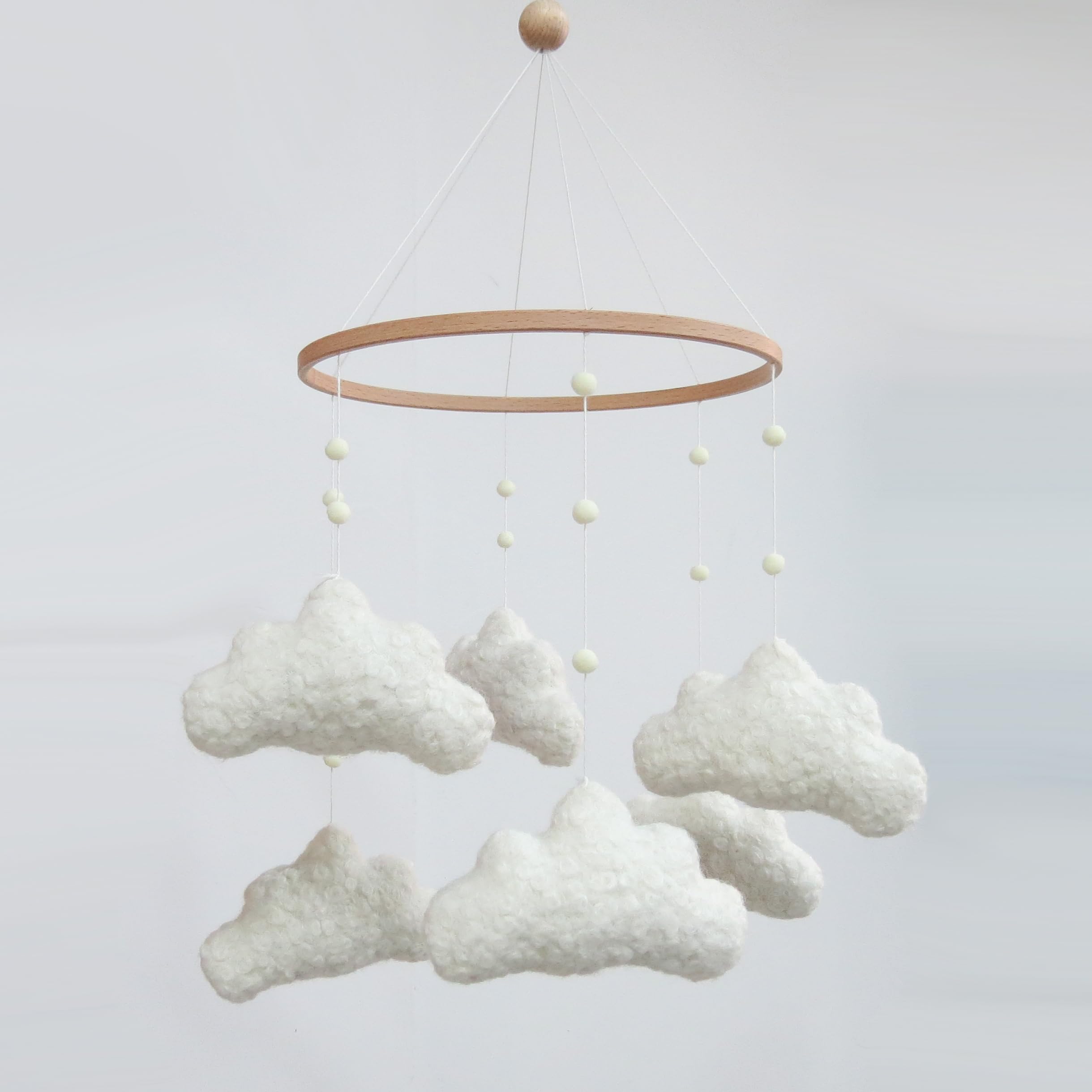 Goukurlsma Cloud Mobile for Crib Boucle Cloud promotes soothing nursery ambience and early auditory development.