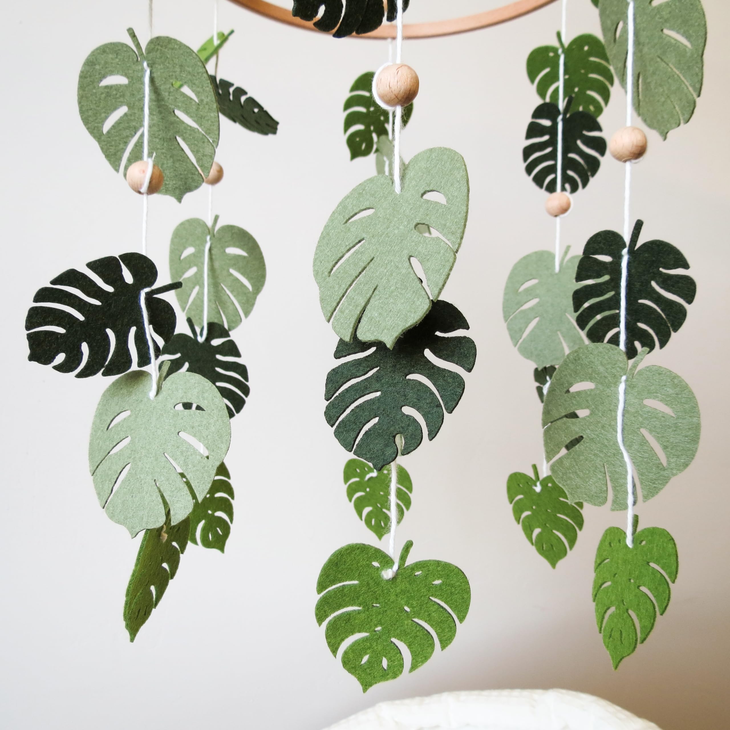 Goukurlsma crib mobile attachment demonstrates easy hanging design for nurseries.