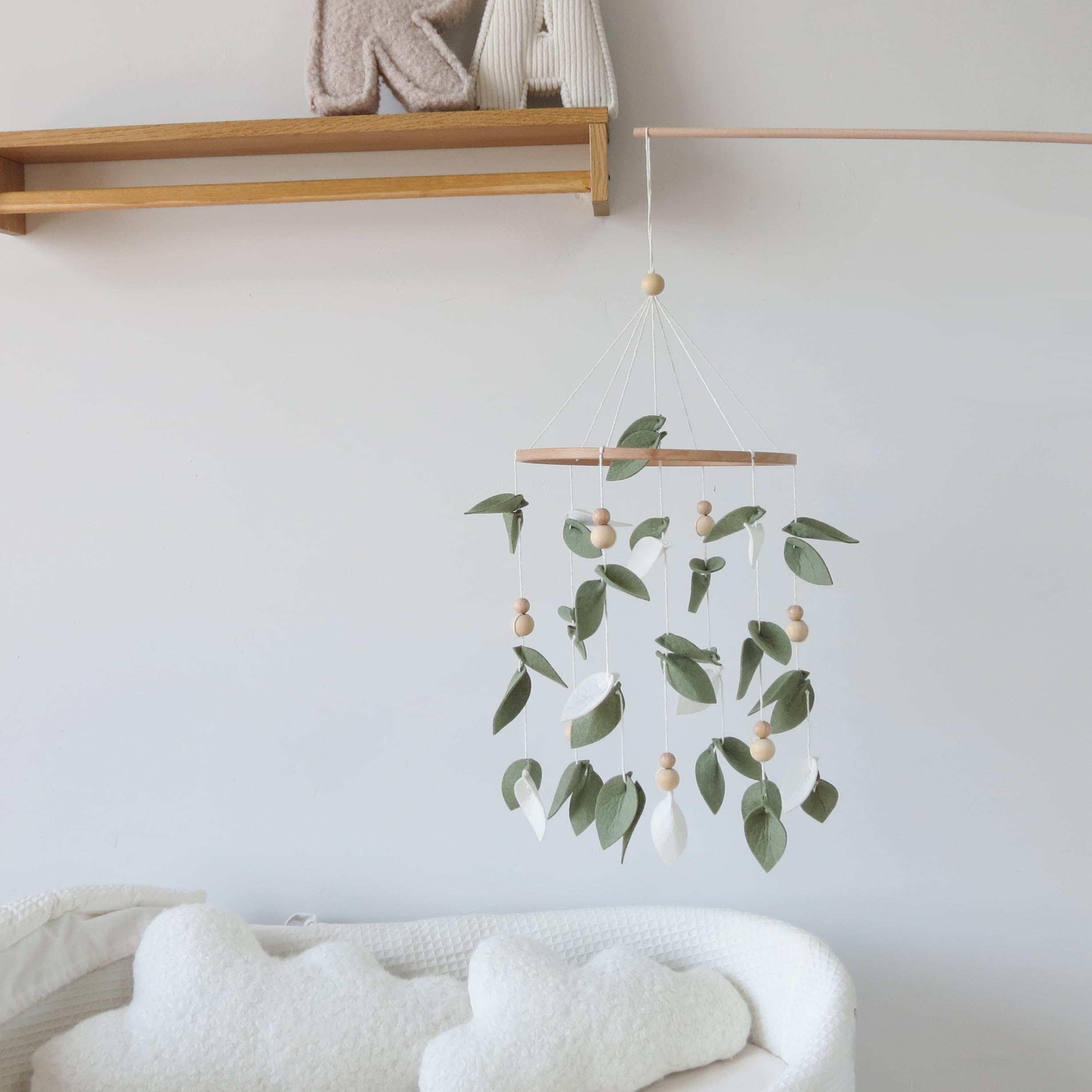 Goukurlsma green-leaf-closeup soft colors promote calm nursery ambiance