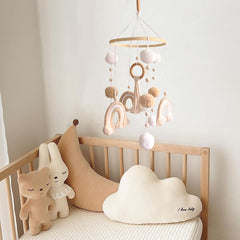Goukurlsma boho rainbow crib mobile enhances nursery ambience with handcrafted textures.