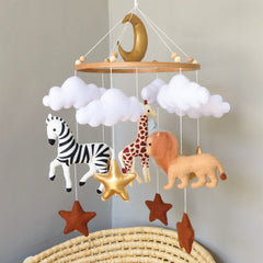 Goukurlsma Jungle Crib Mobile elephant focal point promotes visual tracking and calm during bedtime.