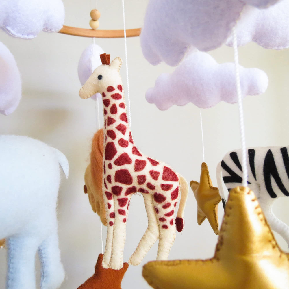 Goukurlsma Jungle Crib Mobile giraffe figure offers gentle motion for soothing stories.
