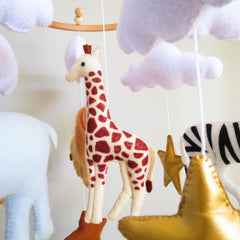Goukurlsma Jungle Crib Mobile giraffe figure offers gentle motion for soothing stories.