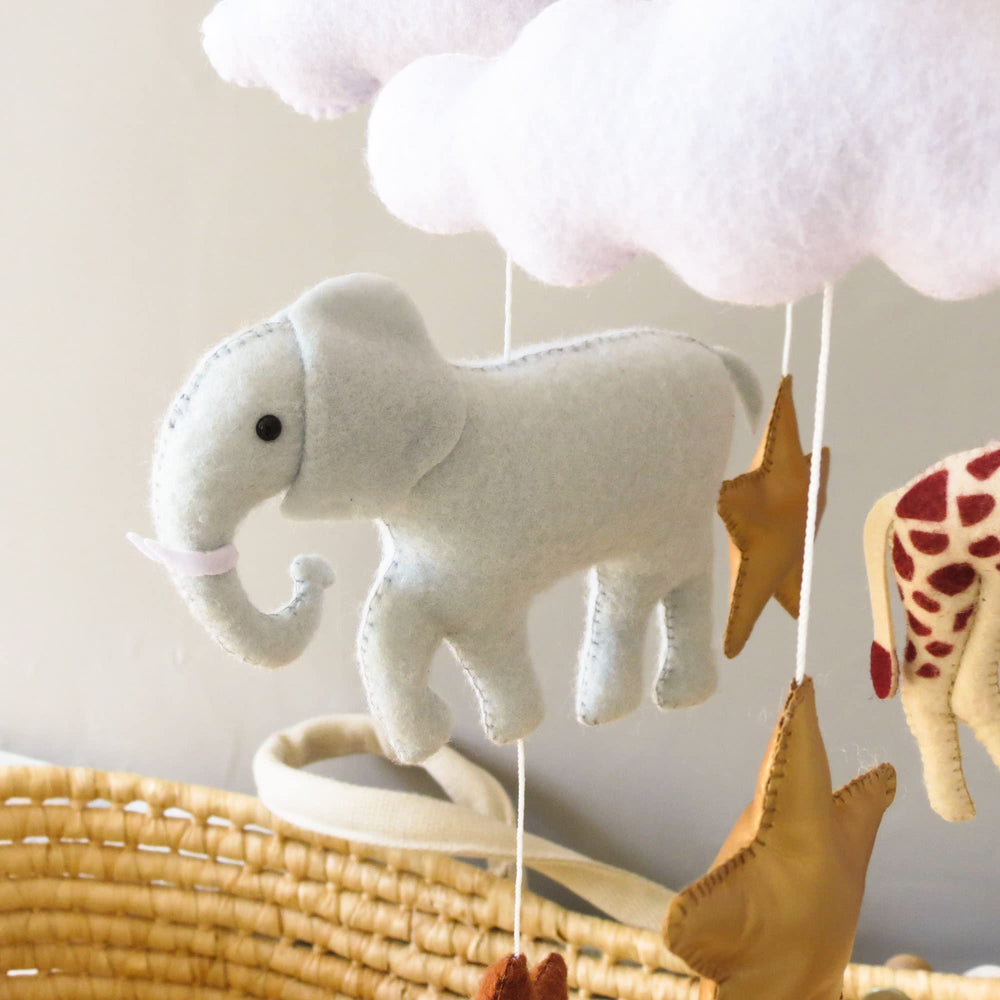 Goukurlsma Jungle Crib Mobile moon and clouds create dreamy nursery ambiance.