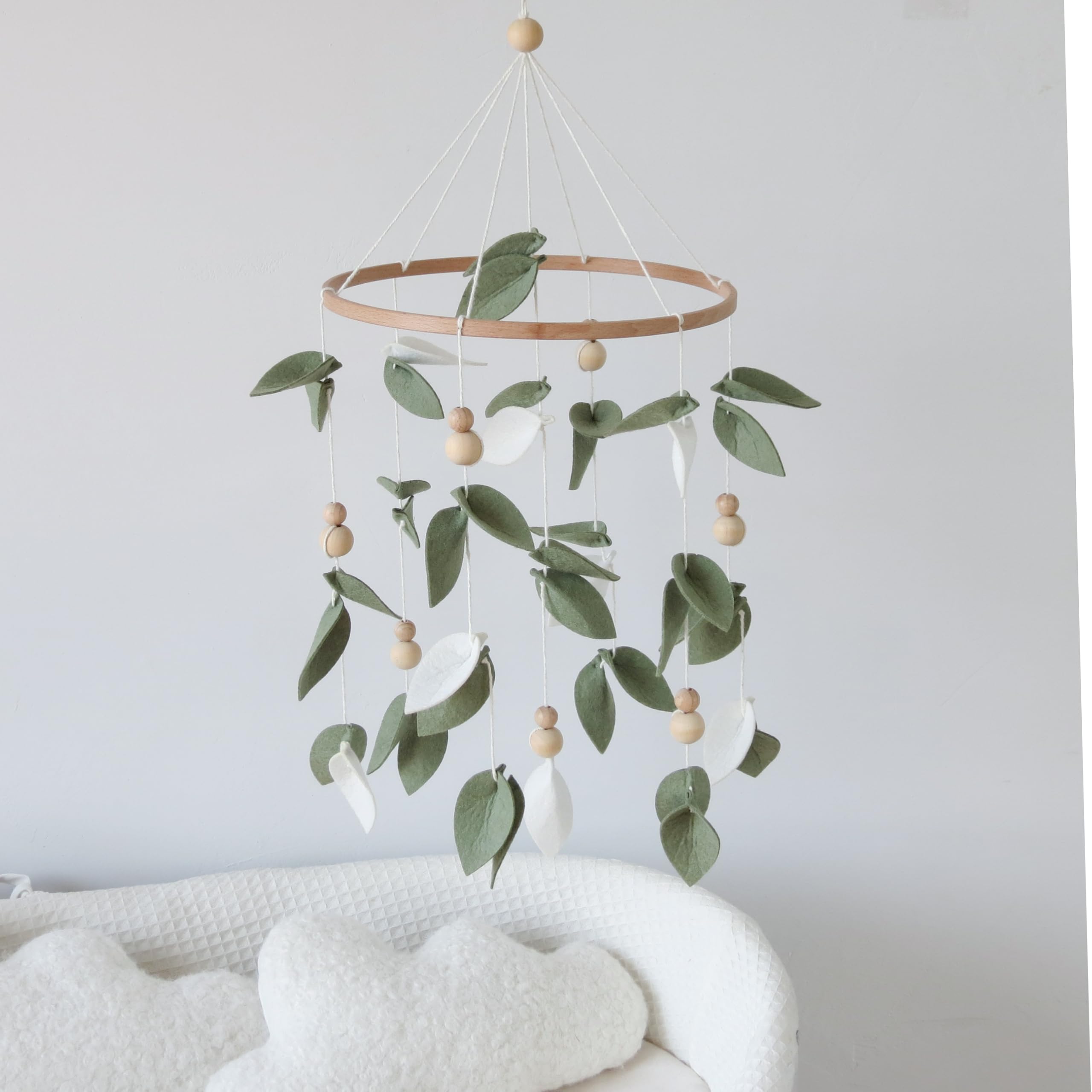 Goukurlsma natural-wood-berries-detail beads provide tactile interest for newborns
