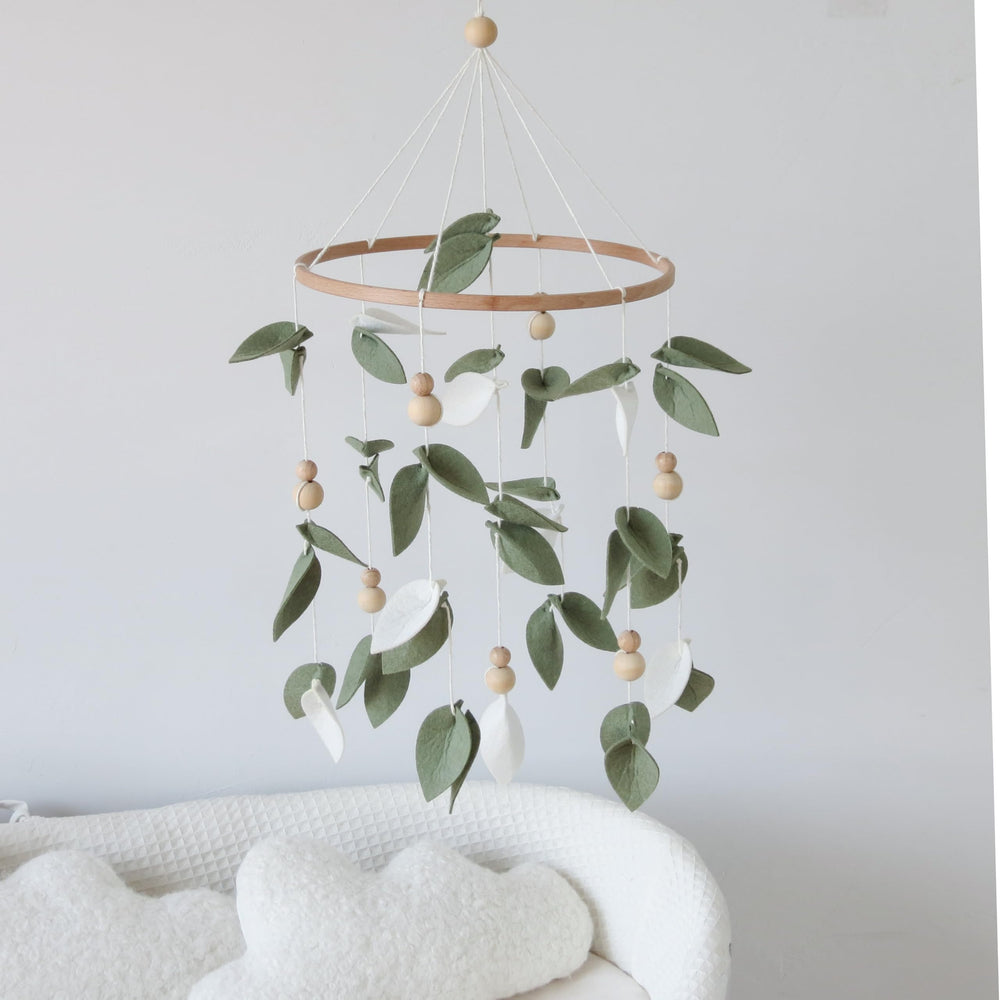 Goukurlsma natural-wood-berries-detail beads provide tactile interest for newborns