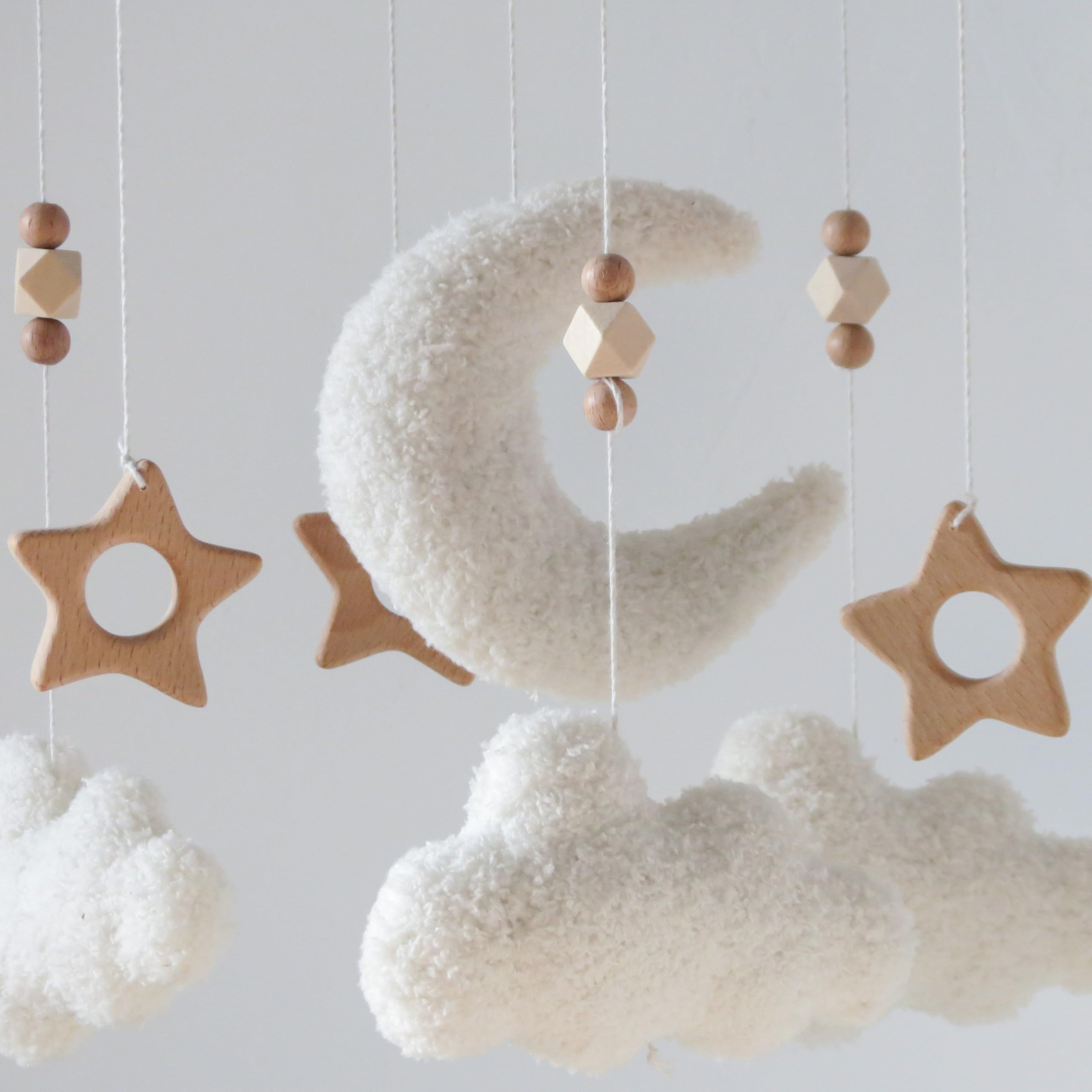 GOUKURLSMA Cloud Moon fits neutral boho nurseries with white, cream, and wood tones