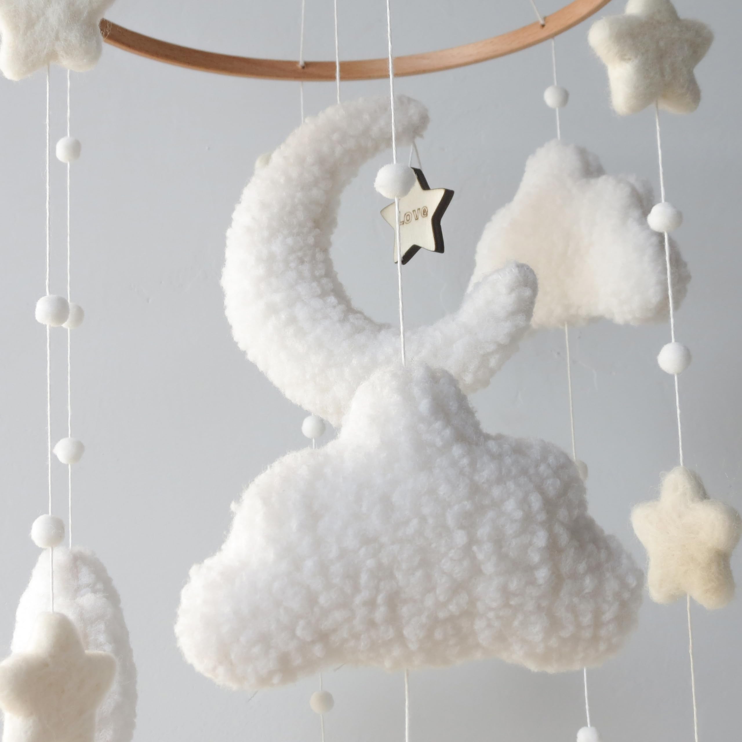 Goukurlsma neutral nursery mobile setup, versatile decor for any gender-neutral room.