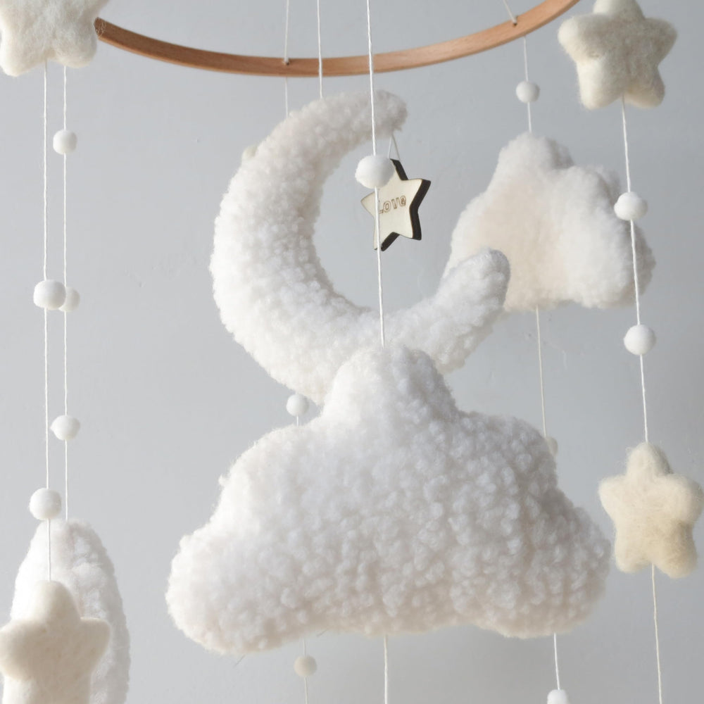 Goukurlsma neutral nursery mobile setup, versatile decor for any gender-neutral room.