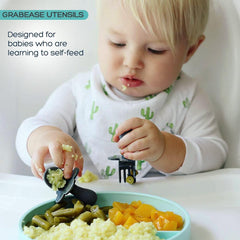 Grabease anti-choke collar on infant fork for safer self-feeding sessions.