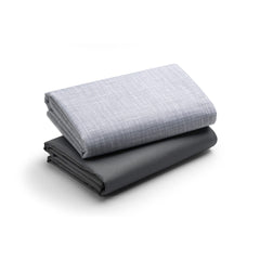 Graco Pack 'n Play waterproof sheets closeup showing soft woven grey fabric for comfy naps