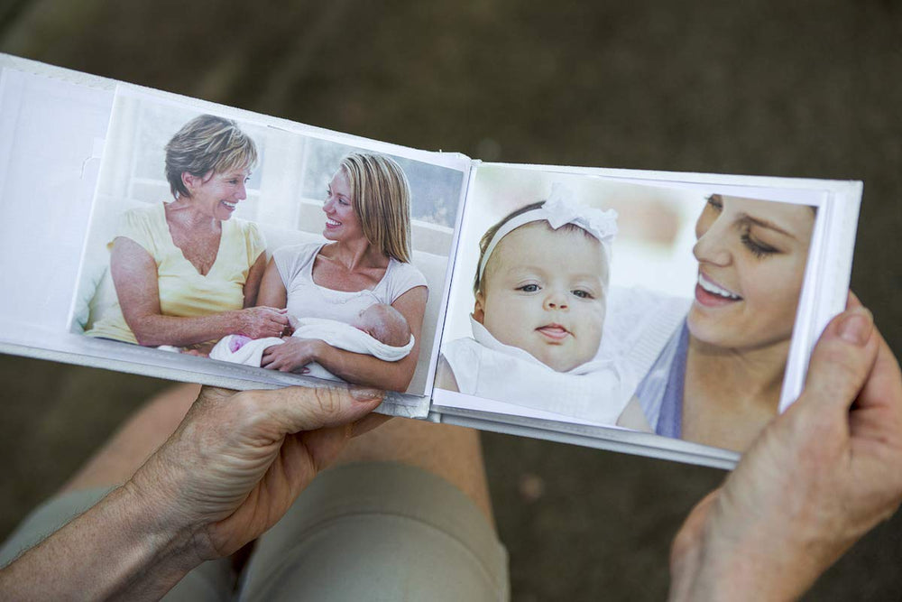 Grandparent Gift Co. brag book inside pages hold cherished 4x6 photos for on-the-go sharing.