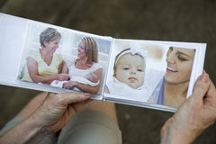 Grandparent Gift Co. brag book inside pages hold cherished 4x6 photos for on-the-go sharing.