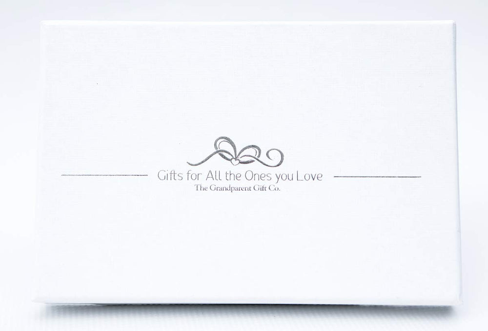Grandparent Gift Co. brag book fits in a purse or desktop display for quick memories.