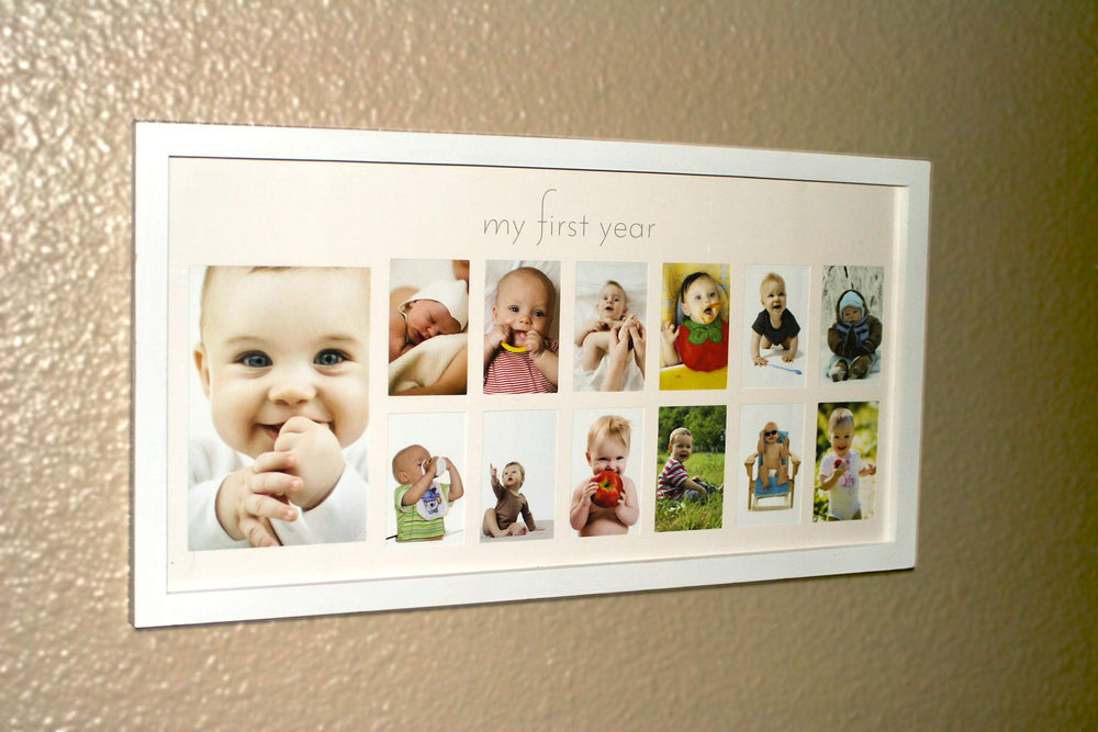 Green Pollywog baby frame hanging in nursery shown for easy display