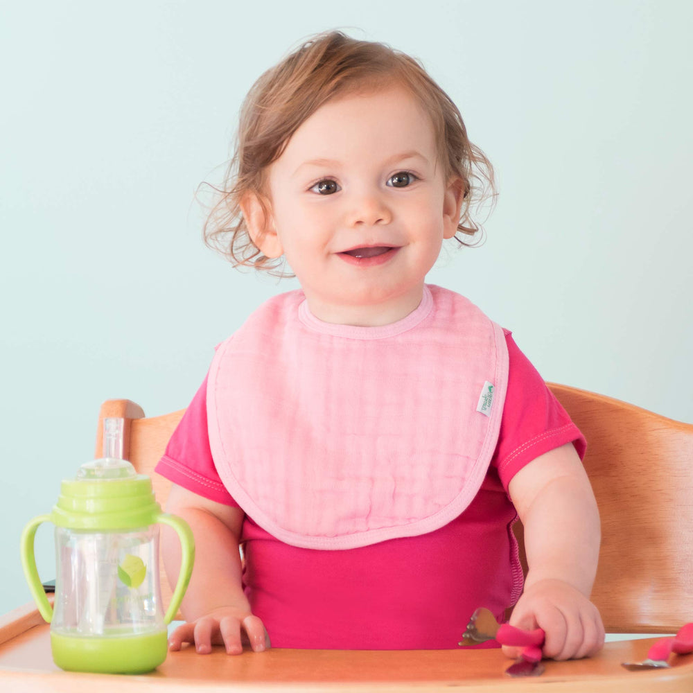 Green Sprouts adjustable snap-closure bib grows with baby for longer use.
