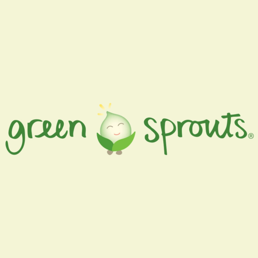 Green Sprouts burp cloths on changing table ready for quick cleanups