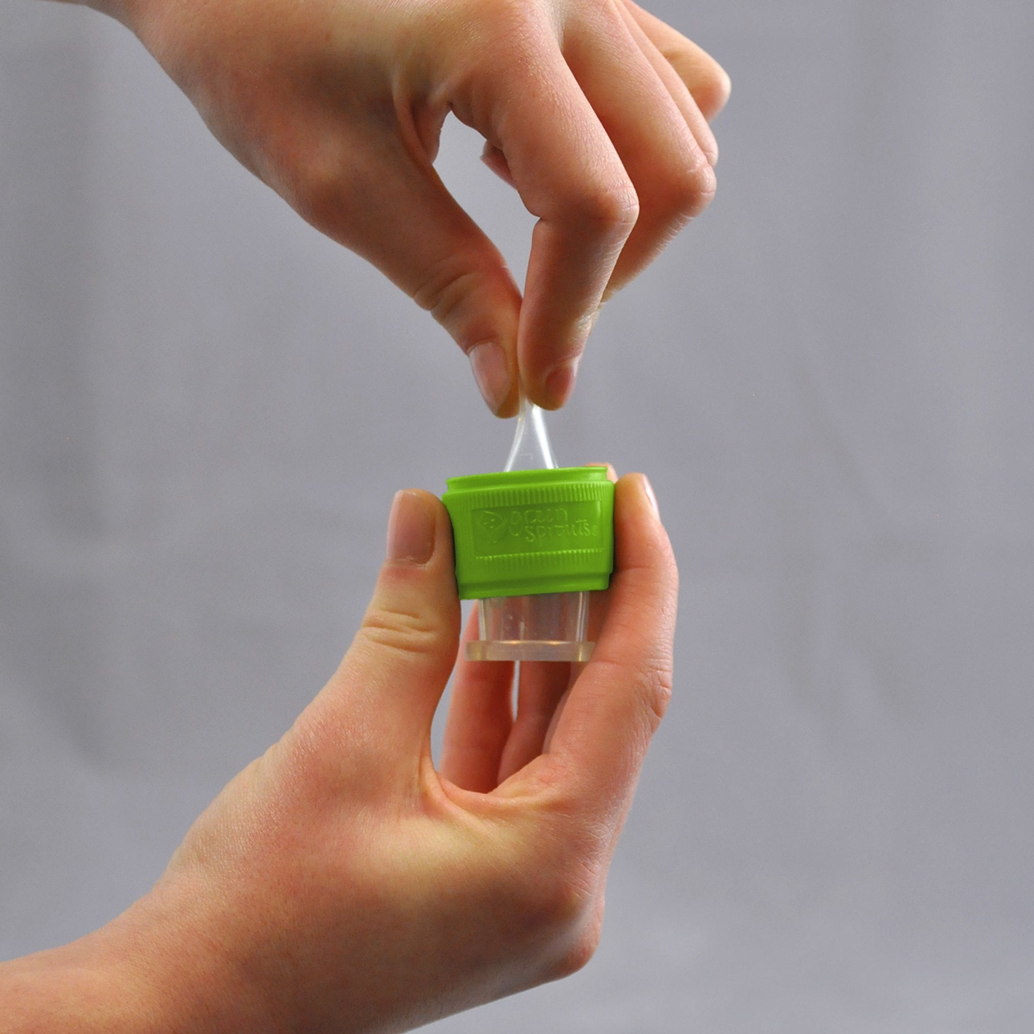 Green Sprouts Spout Adapter travel cap keeps spout clean on trips.
