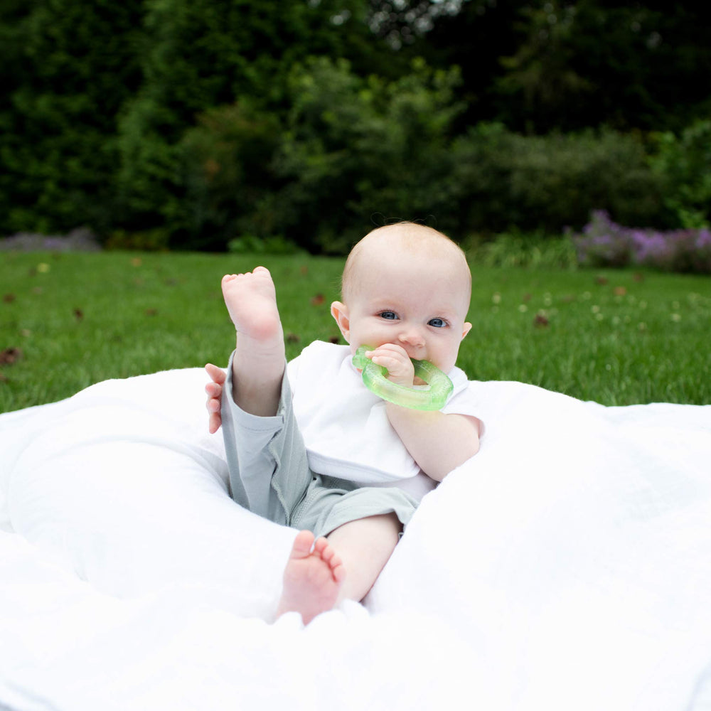 Green Sprouts Stay-Dry Bib Rose OEKO-TEX certified label for baby-safety assurance.