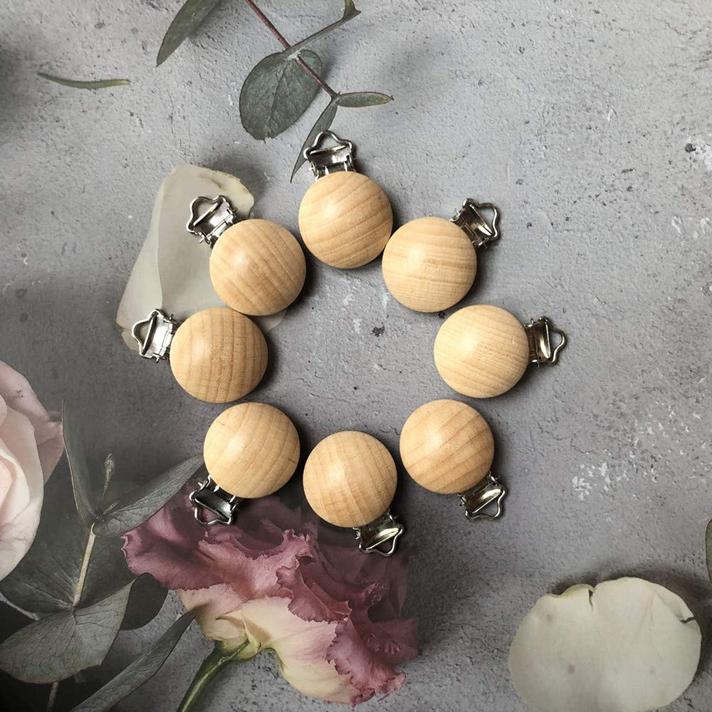 Greneric natural-tone pacifier clip product shot highlighting warm finish.