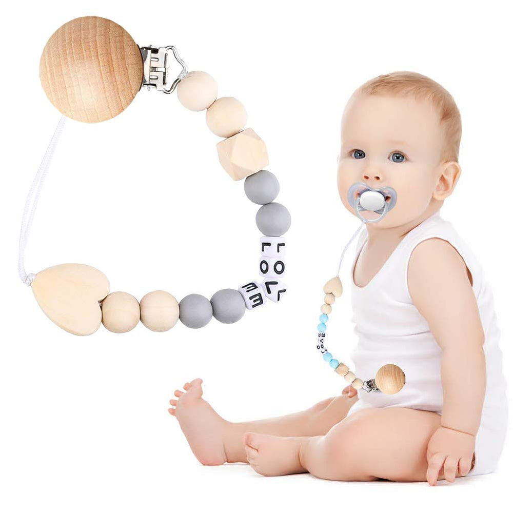 Greneric pacifier clip on stroller strap for on-the-go convenience.